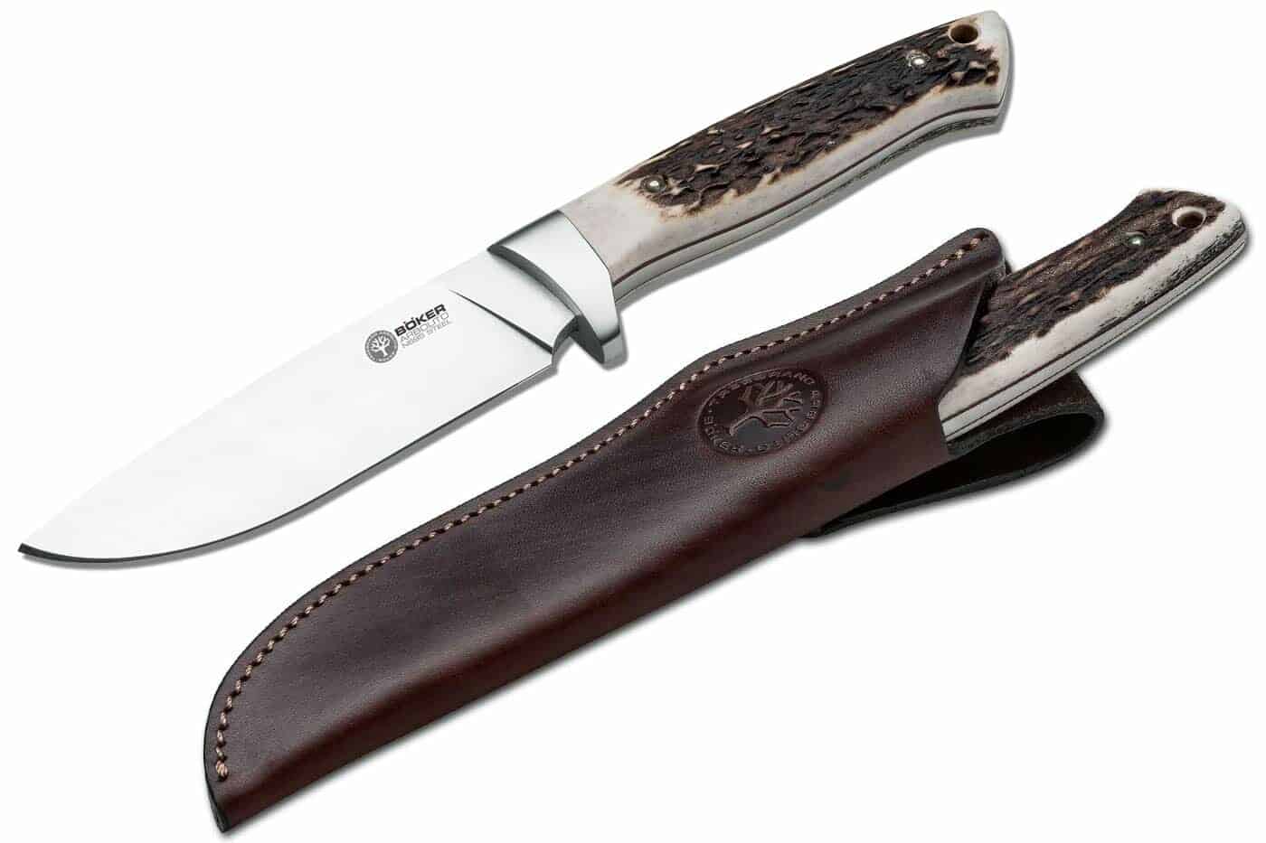 The Boker Arbolito Hunter tactical knife shown both inside and outside the shesth.