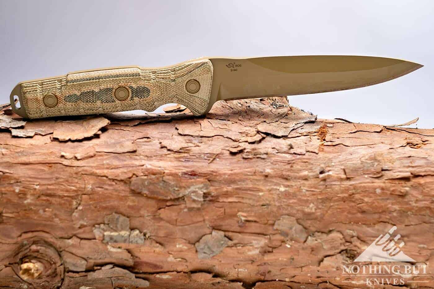 The Buck Ground Combat Knife (GCK) sitting on a log