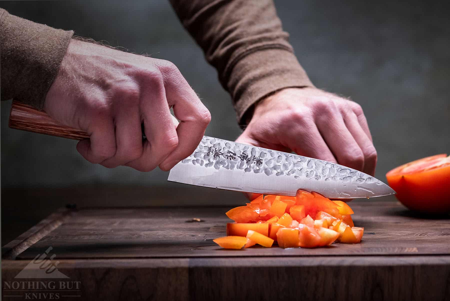 The seven inch chef knife that ships with the Kanetsune KC-950 Japanese knife set is smaller than the average Western style chef knife, but it capable and well balanced. 