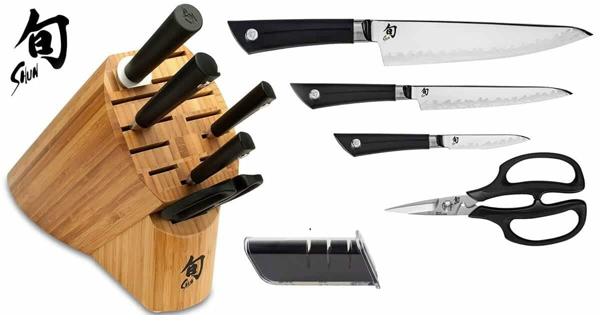 The Shun Sora six piece knife set shown with the knives next to the wooden storage block.