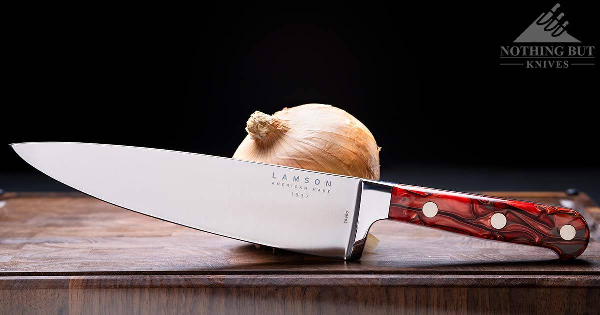 Best Professional And High End Kitchen Knife Sets In 2023 45 The Lamson Premiere Fire 8 inch chef knife profile shot showing the full bolster and text on the blade.