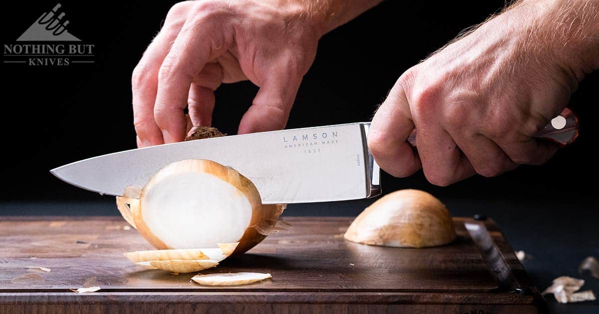 Best Professional And High End Kitchen Knife Sets In 2023 46 The American made Lamson 8 inch chef knife slicing through a white onion during our high end knife set test.