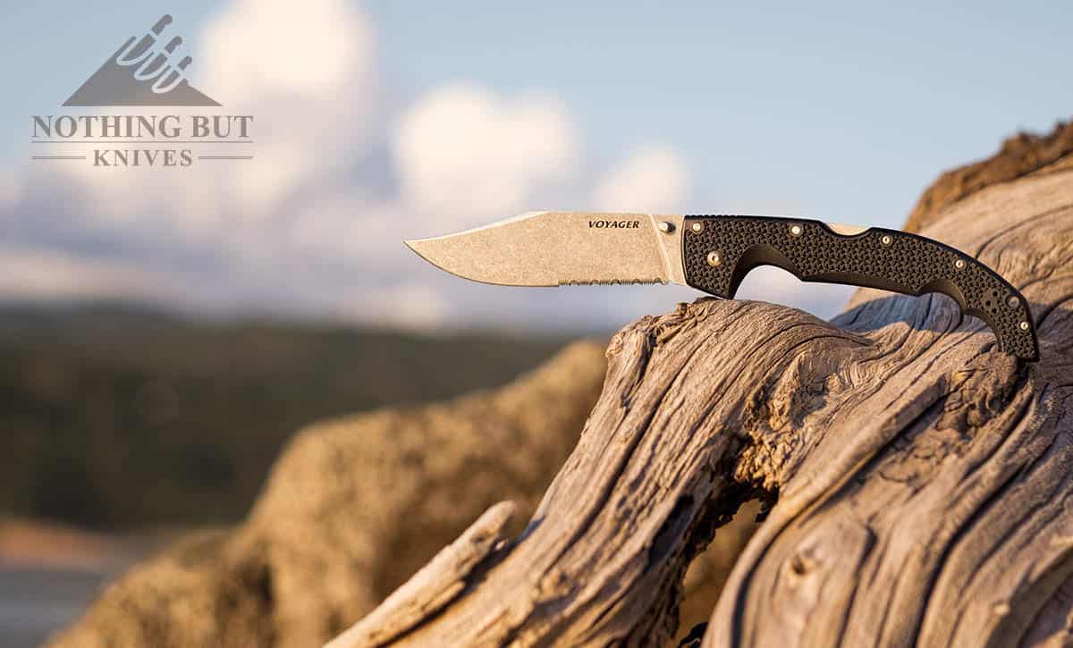 Big folding pocket clip knife outdoors.