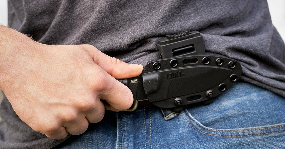 The CRKT Siwi in the front horizontal carry position on a belt. 