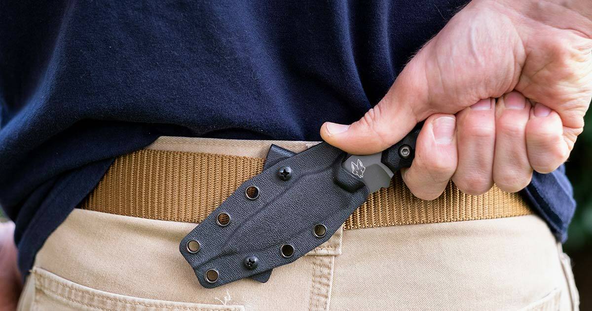 The Southern Grind Jackal Pup being drawn from it's horizontal belt sheath. 