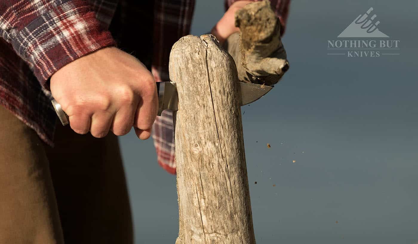 Buck Selkirk Knife Review - Image 6 The Selkirk batoning through a thick piece of driftwood.
