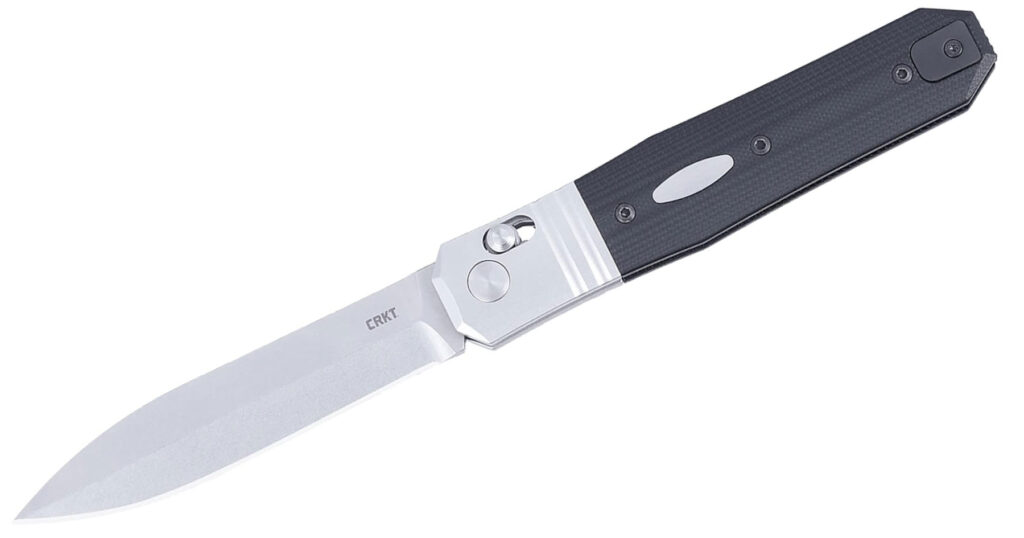 Kershaw And Crkt Knives By Ken Onion - Image 9 The CRKT Redemption knife with its blade in the open position on a white background.
