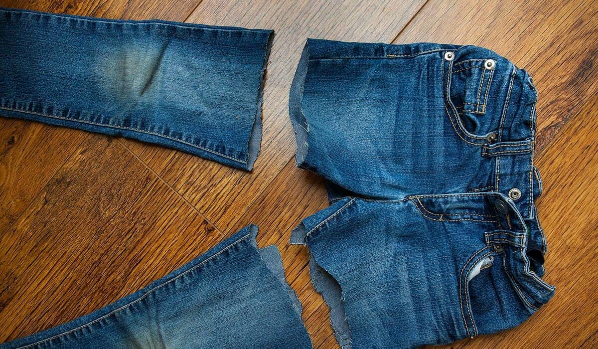 Straight edges are overated. Just grab a knife and turn a pair of jeans into a great pair of shorts.