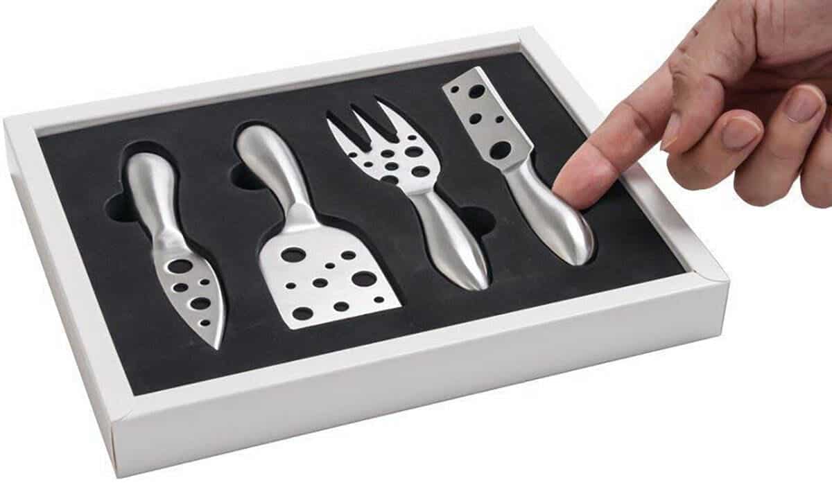 This four peice cheese knife set includes a fork.