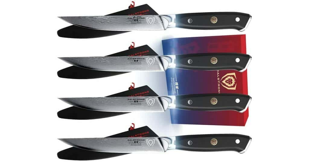 A Dalstrong Shogun series steak knife set of four with the knife sheaths and boxes. 