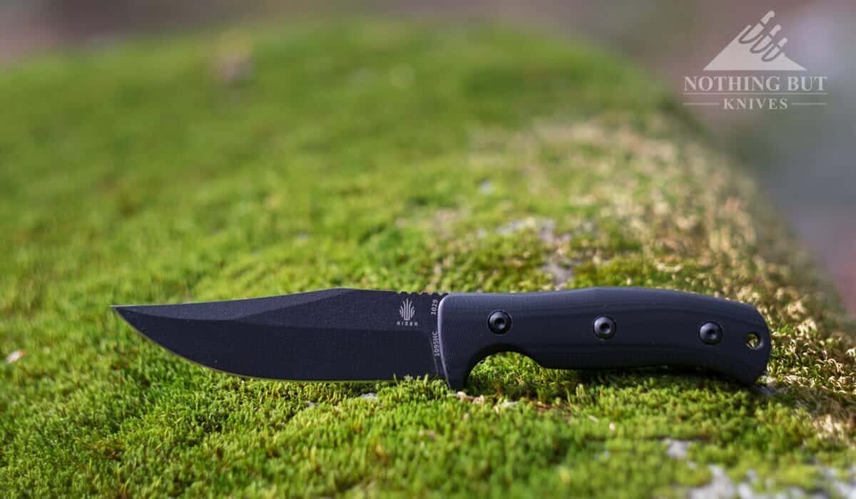 The Kizer Litltle RIver Bowie is an excellent camping and survival knife with a few flaws.