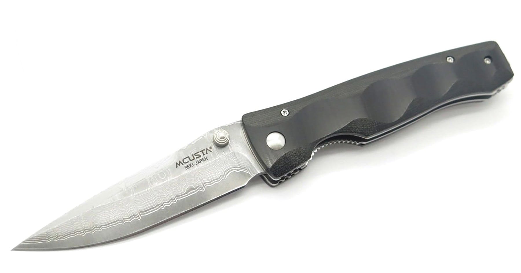 A Few Of Our Favorite Japanese Pocket Knives - Image 9 An overhead view of the Macusta Tactility pocket knife from Japan shown here with its blade in the open position on a white background.