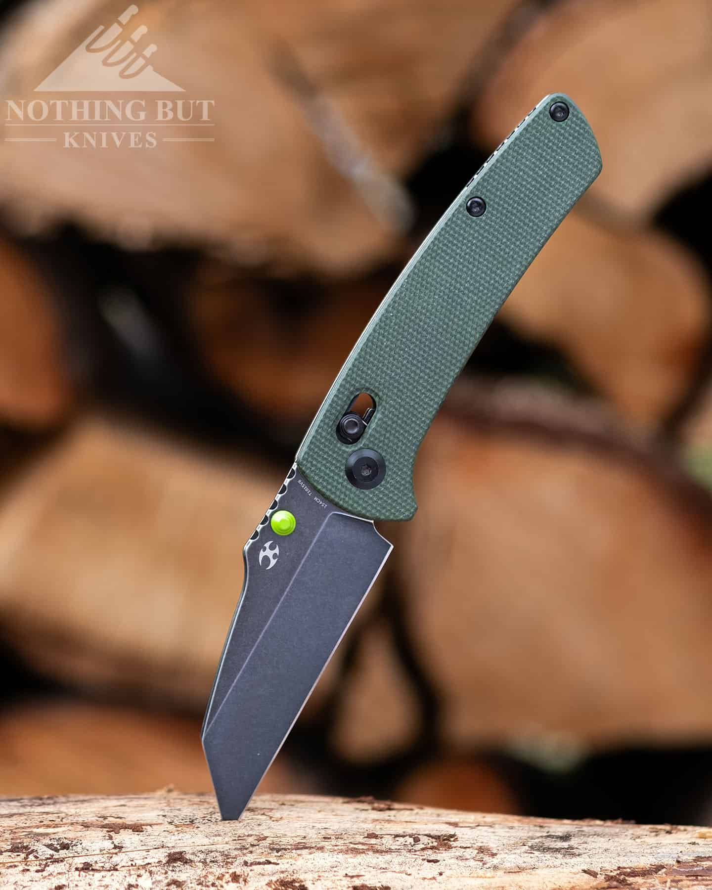 Working outdoors with the Kansept Main Street folding knife. 