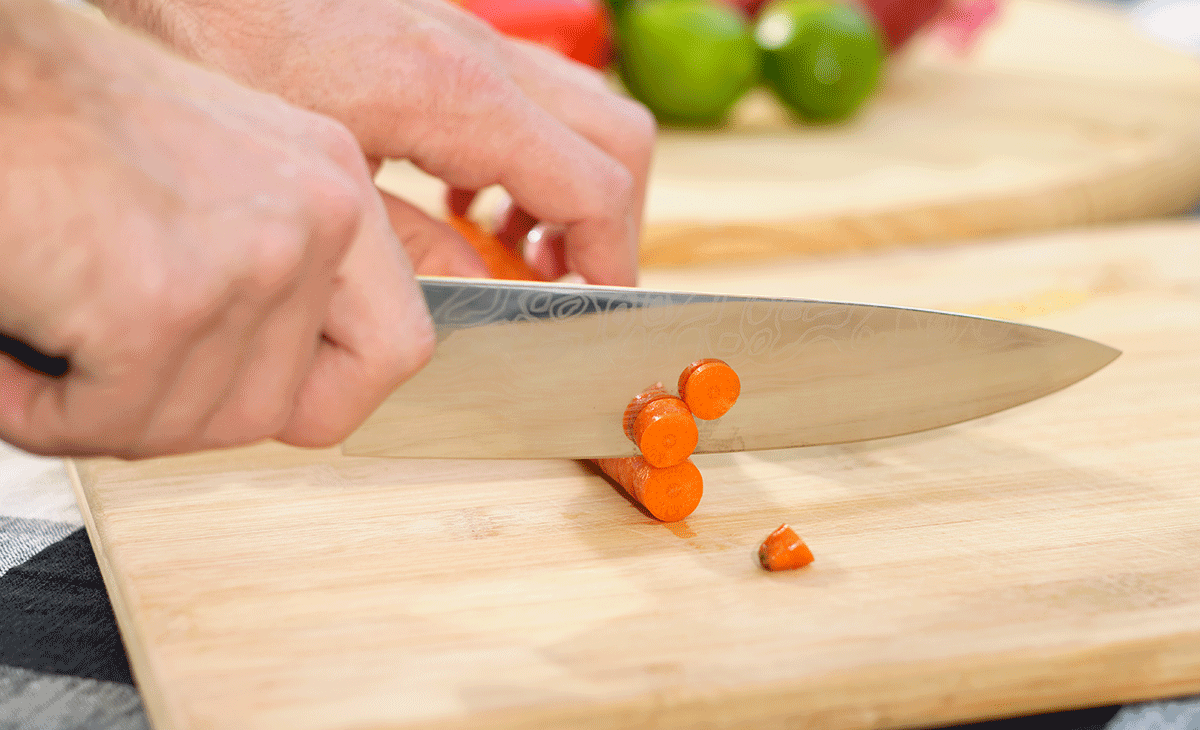 The blade of this 8-inch chef knife has slightly sticky sides.