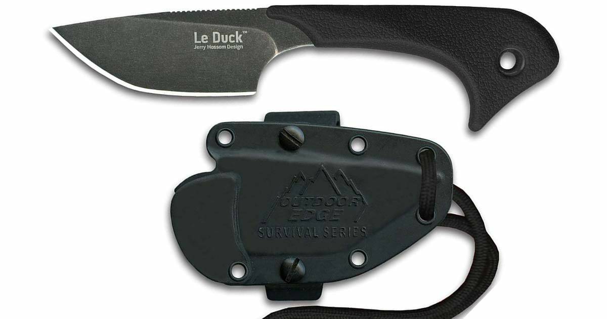 The all black version of the Outdoor Edge Le Duck knife shown sitting next to it's sheath
