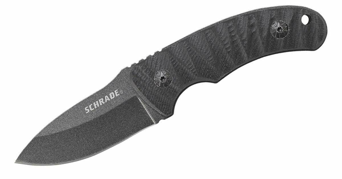 Fixed blade full tang Schrade SCHF57 on a white background pointed left. 