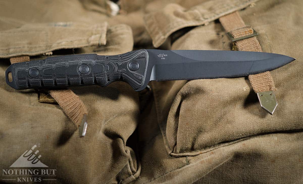 The Buck Ground Combat knife on a military backpack.