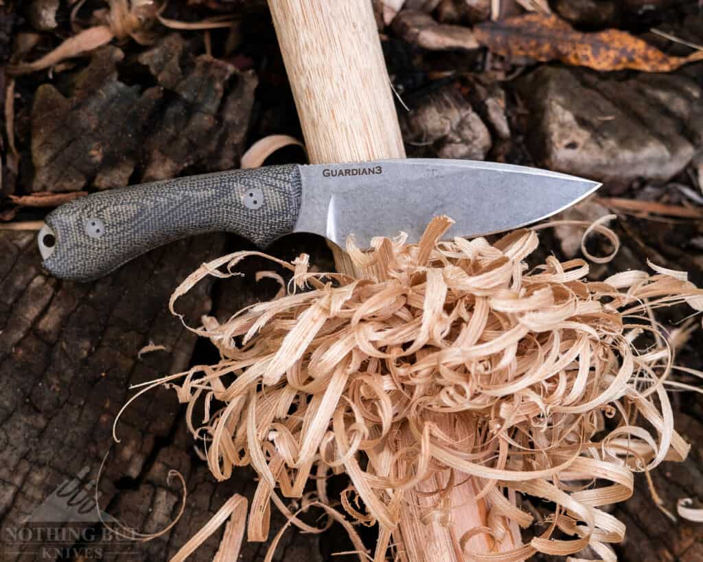 This image shows the feather sticking capability of the Bradford Guardian 3 fixed blade knife. 