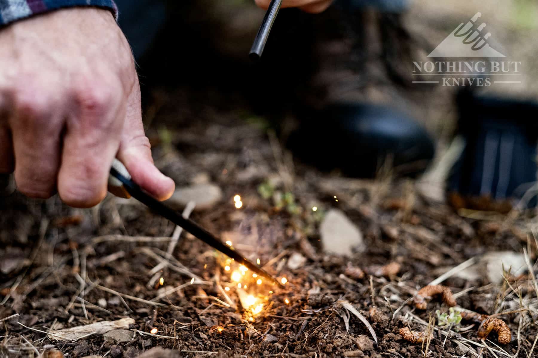 Ontario Knife Company Rat 3 Review - Image 5 It takes a lot of effort to see anything light up when trying to throw sparks with a ferro rod.