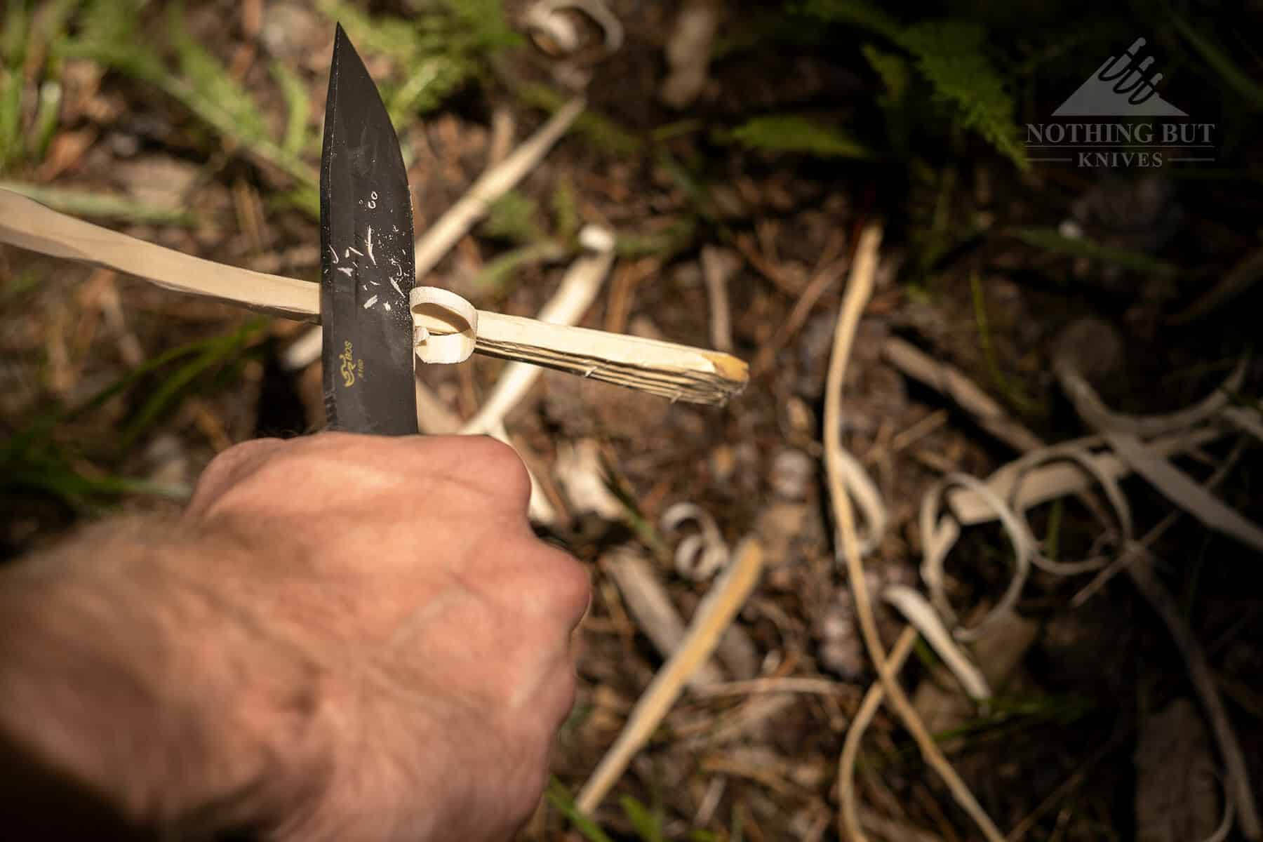 Carving shishkebobs for a camp fire dinner with the Buck 104 Compadre.