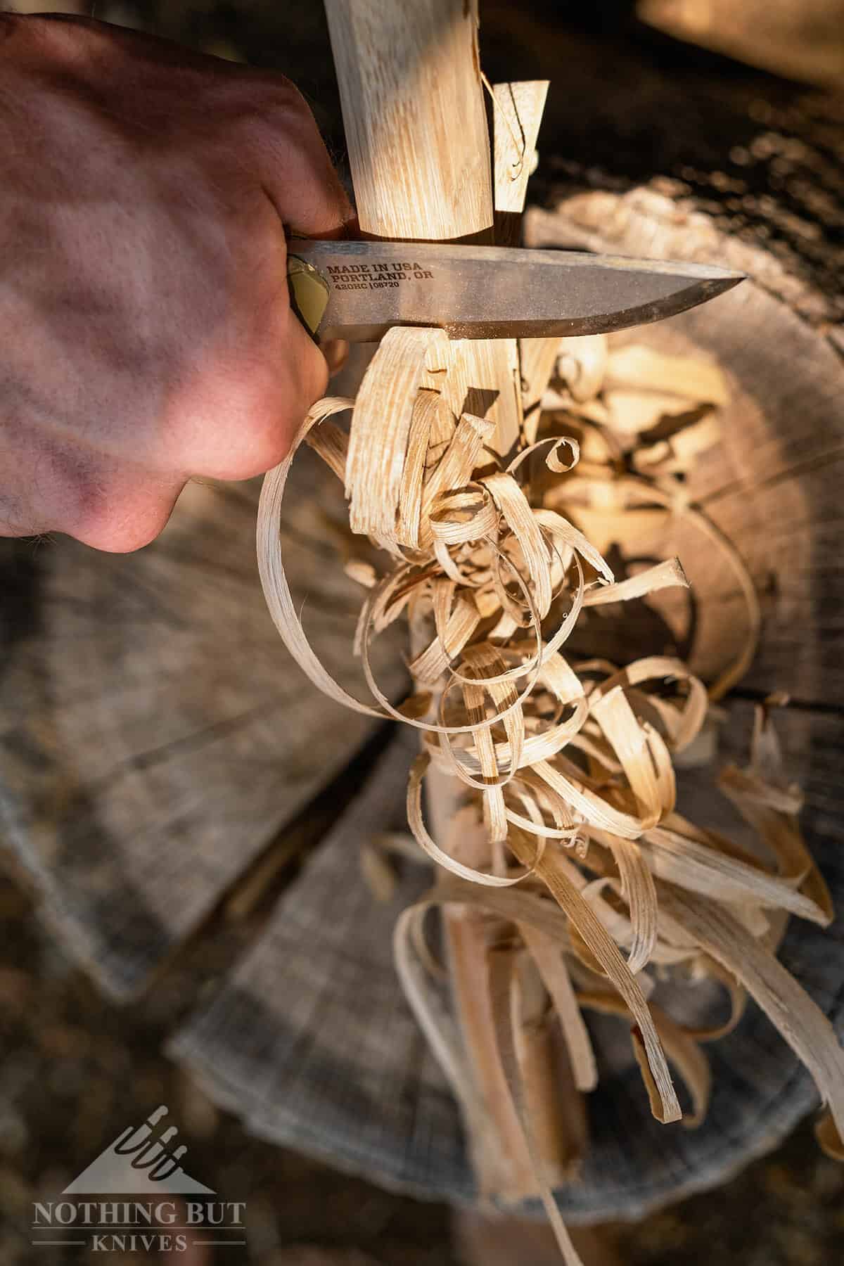 The Principle does a great job at throwing spark and a good job at feather sticking. It is an excellent little fire starter. 