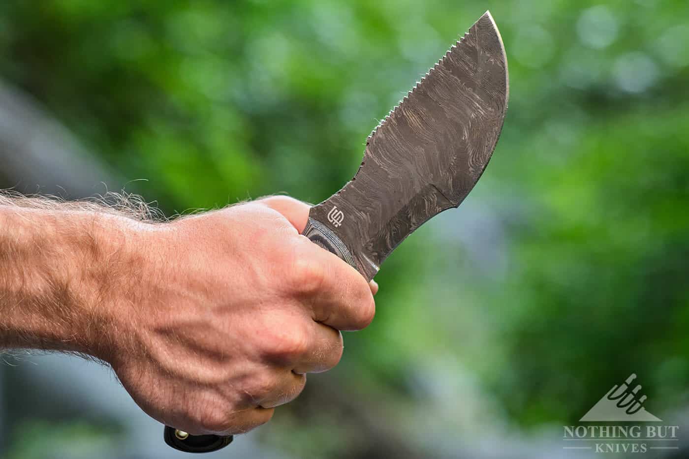 Forseti Steel Ironside Damascus Tracker Review - Image 8 Convention grip with this survival knife is comfortable and secure.