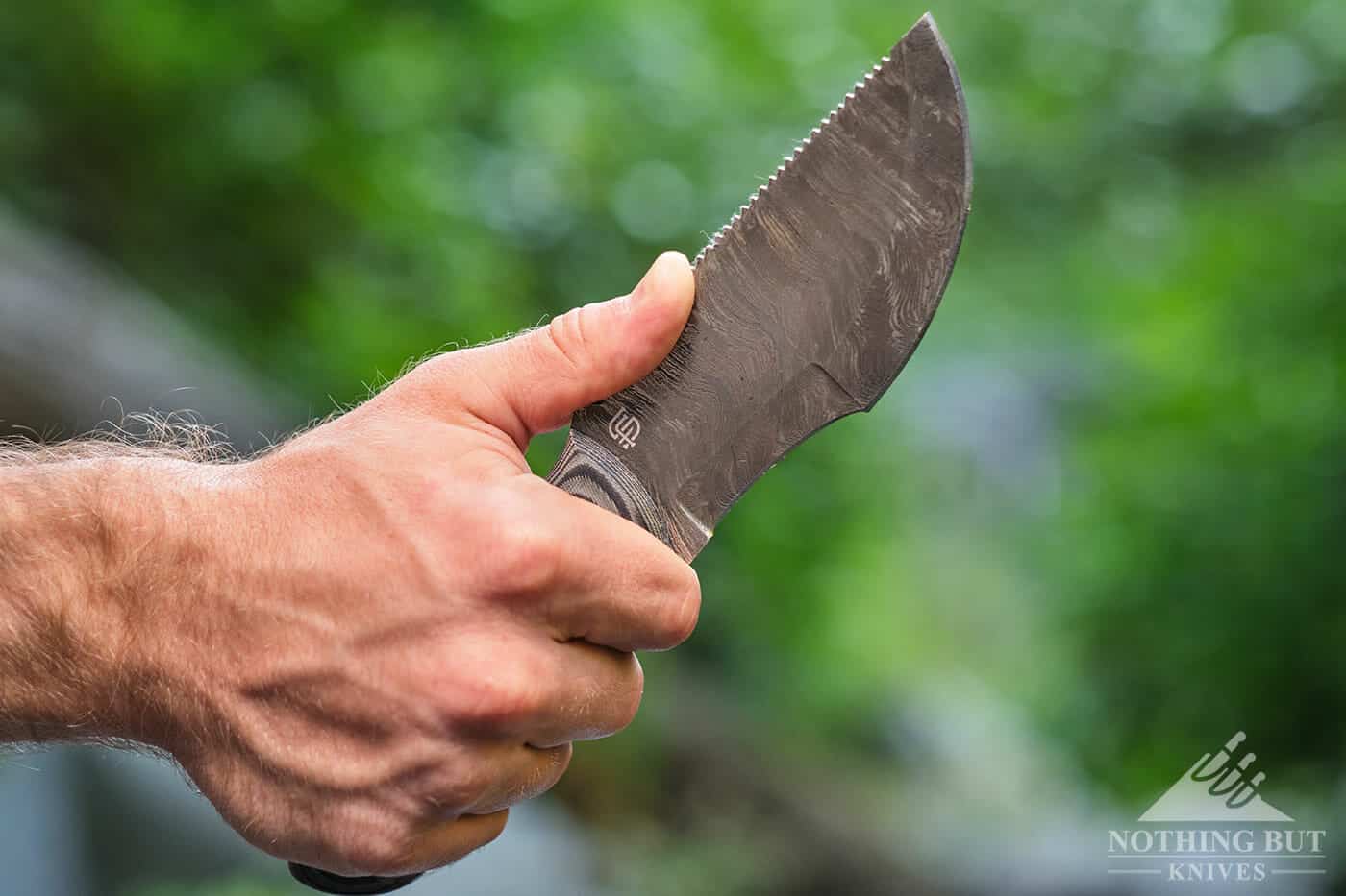 Forseti Steel Ironside Damascus Tracker Review - Image 9 Grip with thumb on the spine of the knife for added support.