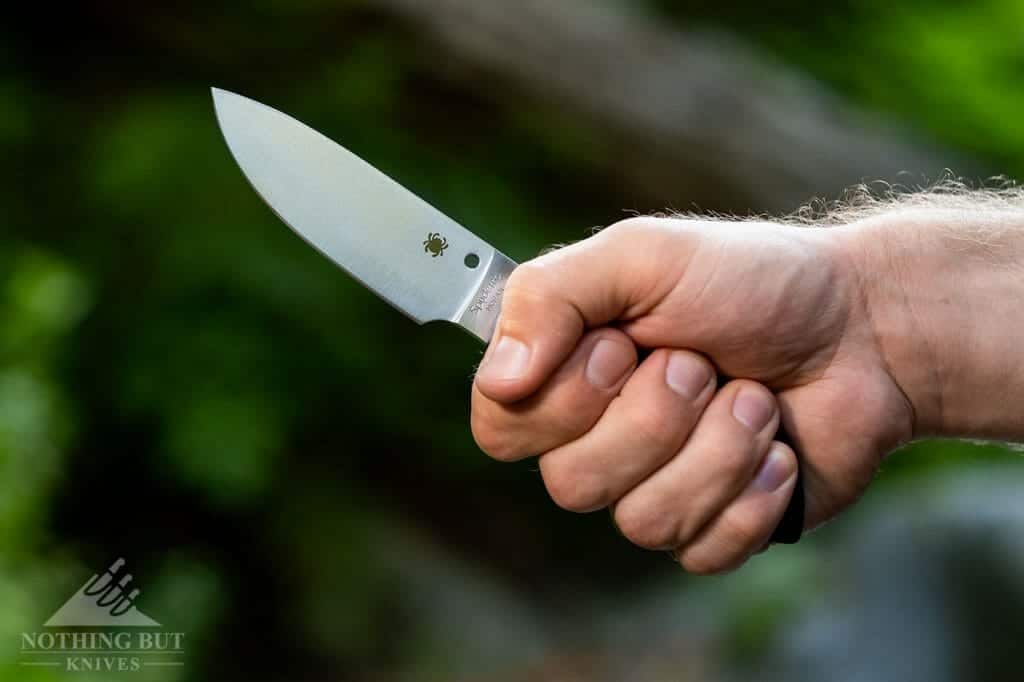 Hand gripping the comfortable rubber handle of the Spyderco Bill Moran. 