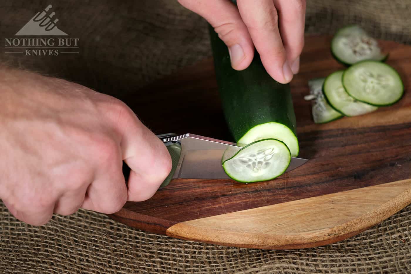 The Off-Grid Rhino slicing a cucumber. 