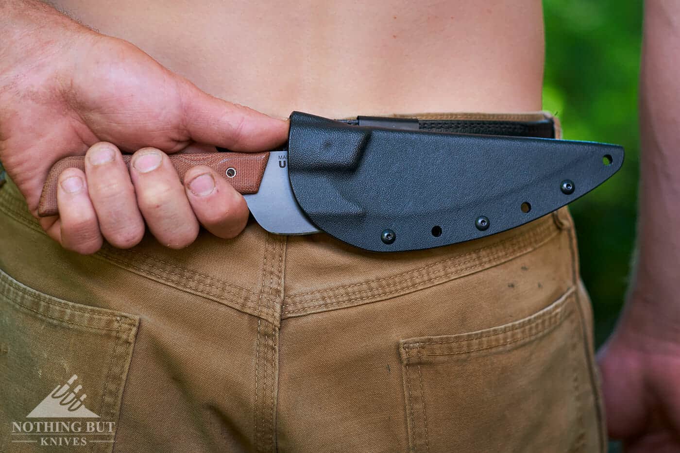Tops Knives Frog Market Special Review - Image 4 The spring belt clip on the sheath is nice, but it would be better if it was removable.