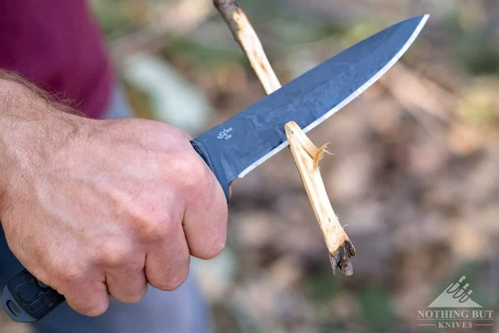 The Sniper Gray Buck GCK carving a stick