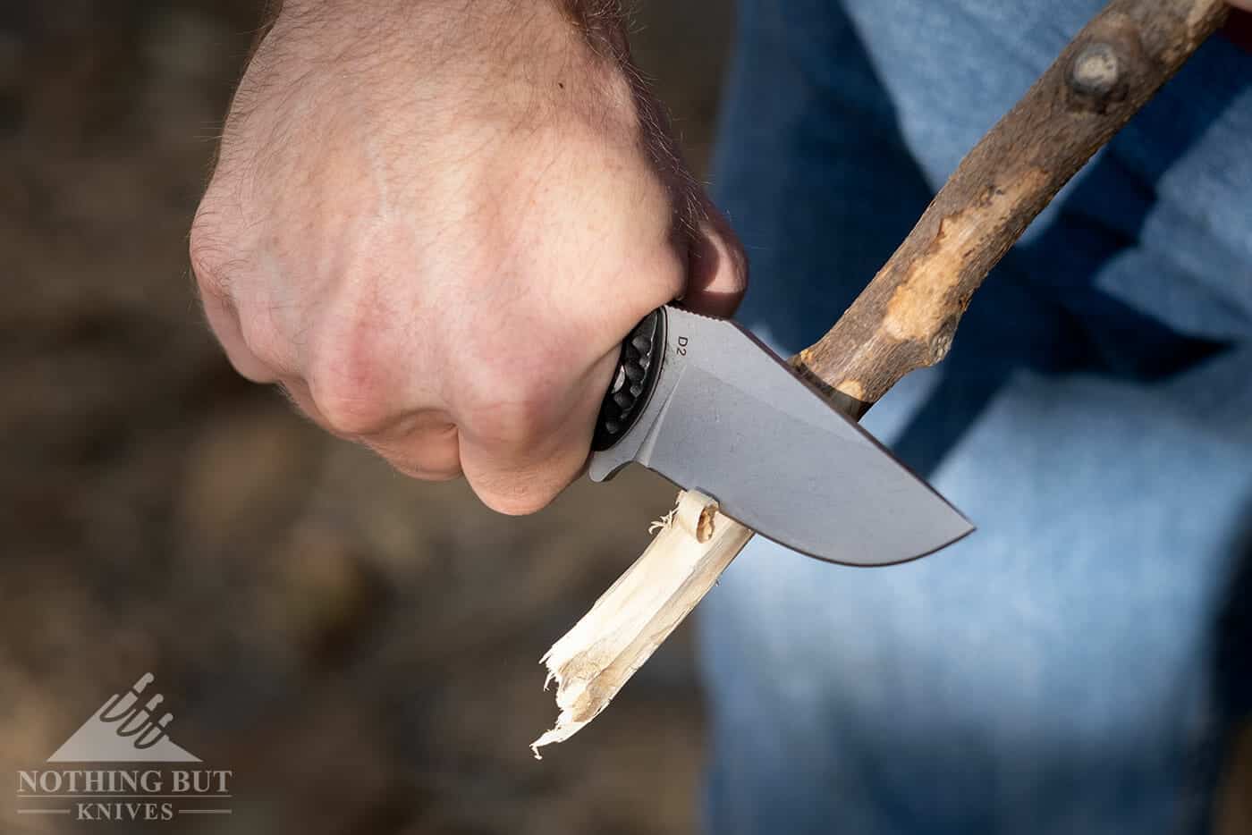 Off-Grid Knives Badger Review - Image 13 Sharpening a stick with the Off-Grid Badger folding knife.