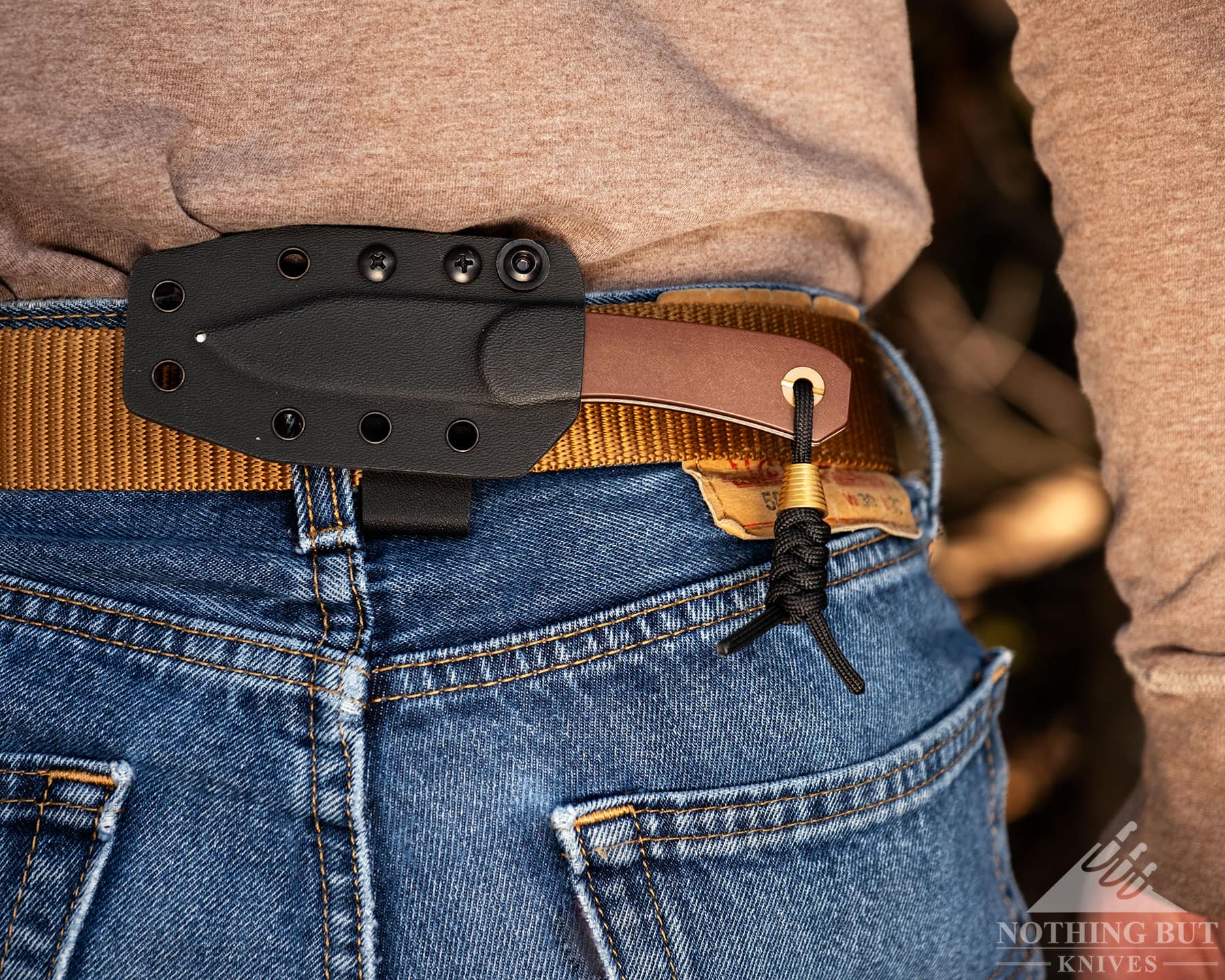 The Lander 4 fixed blade shown here in its kydex sheath set up for horizontal carry.