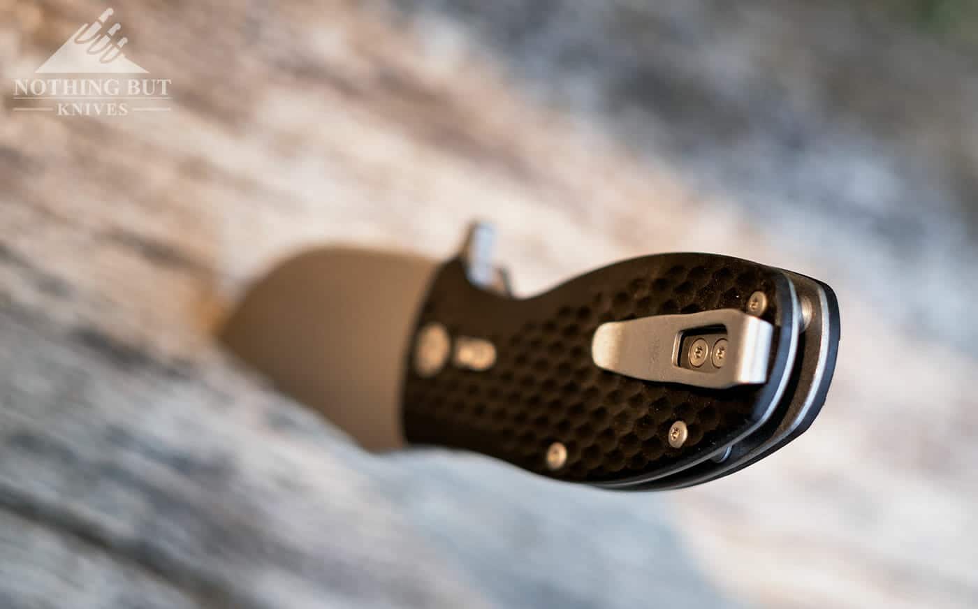 Off-Grid Knives Badger Review - Image 8 Shallow depth of field image of the Badger's pocket clip.