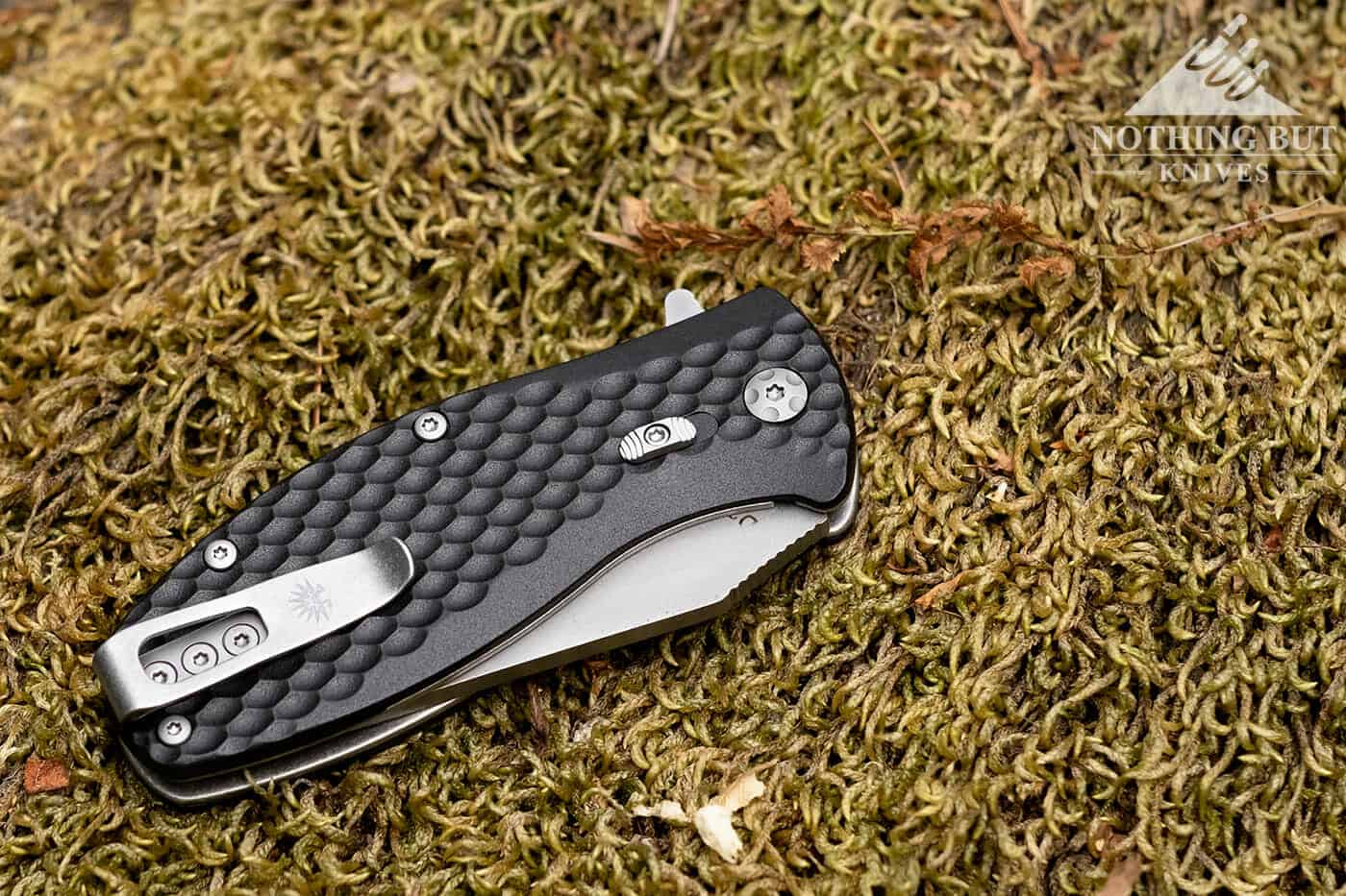 Off-Grid Knives Badger Review - Image 6 The Off-Grid Badger sitting in the closed position clip side up.