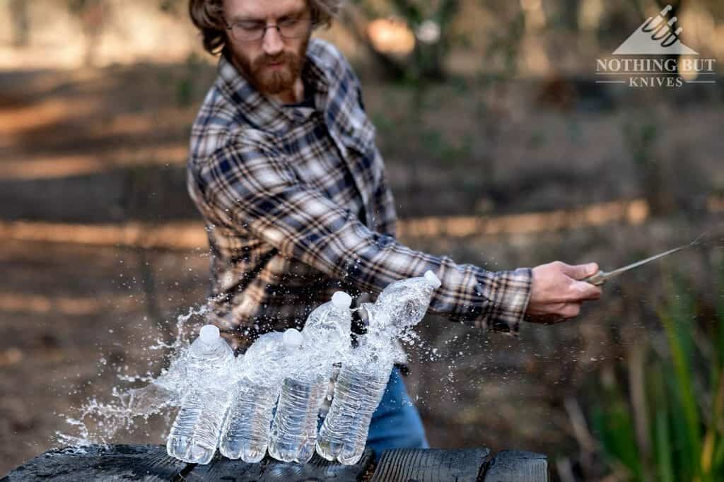 Slicing through 5 water bottles with the Buck Ground Combat Knife (GCK).