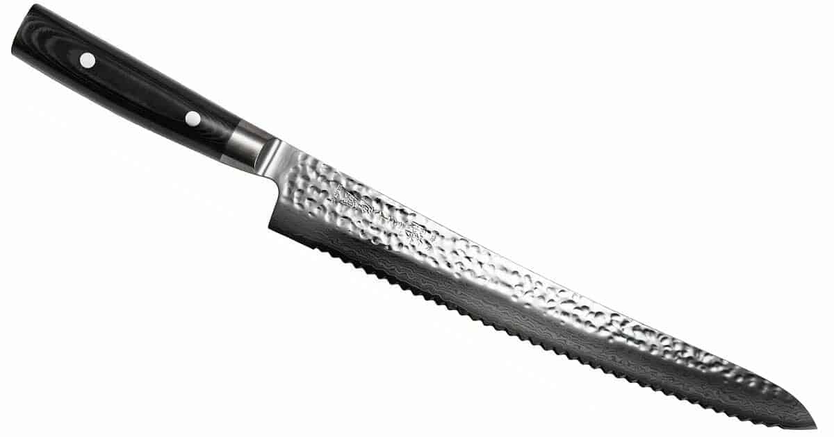 The Yaxell Zen 10.7 inch bread knife with a hammered Damascus steel blade. 