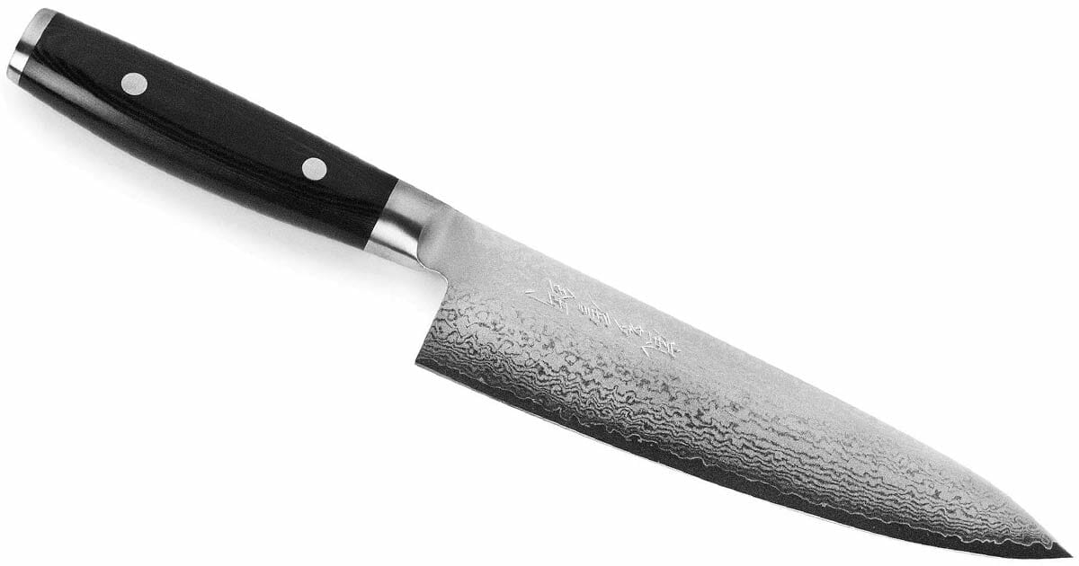 The Yaxell Ran 8 inch Damascus steel chef knife on a white background.