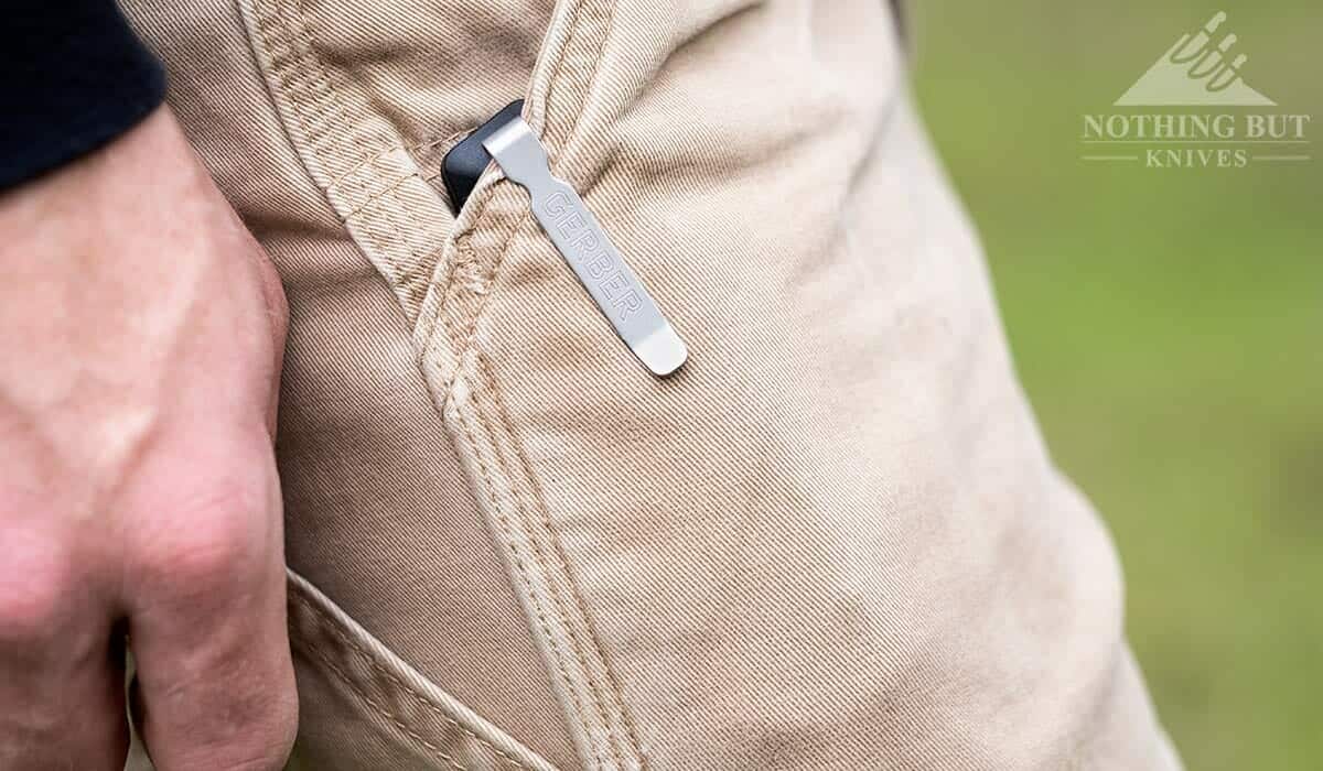 Gerber Sedulo Review - Image 12 The deep carry pocket clip of the Sedulo clipped over the pocket of a man's pants.