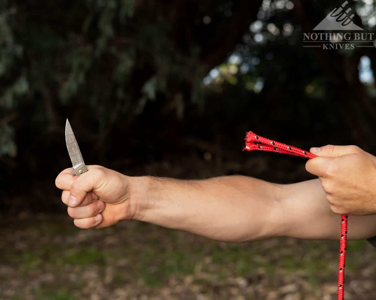 The 3V Gear React pocket knife after it sliced through rope. 