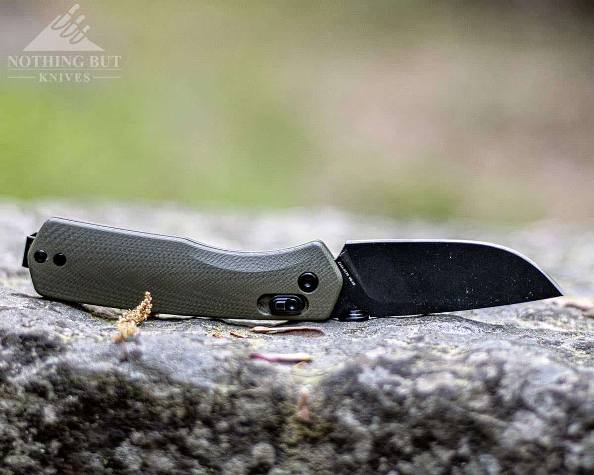 The James Brand Carter with G10 handle upside down outdoors. 