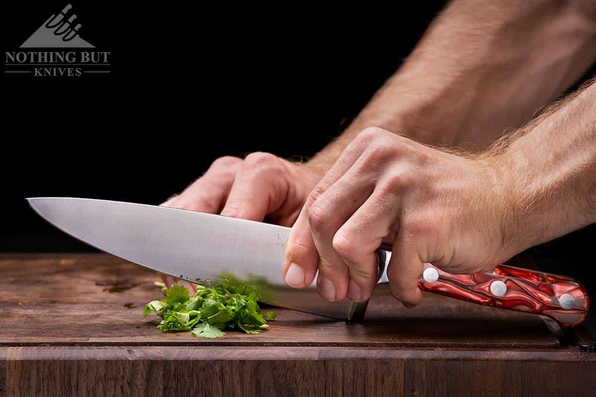 Lamson 8 Inch Premier Forged Chef Knife Review - Image 5 Rock chopping herbs with the Lamson Premier chef knife.