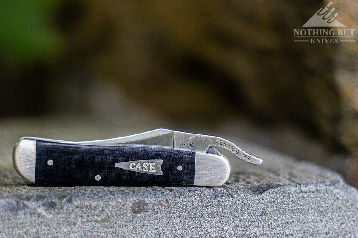 Close-up of the Case RussLock on cement next to a rock wall. 