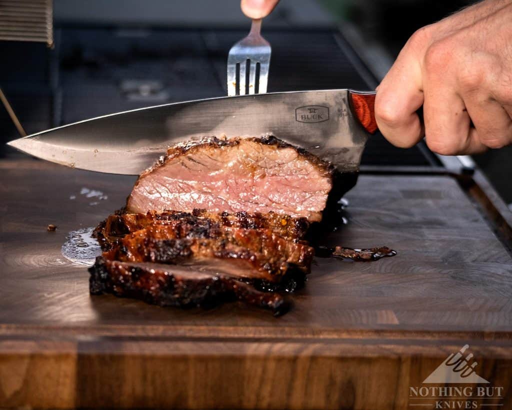 Slicing Barbecue Trip Tip With The Buck Chef Knife
