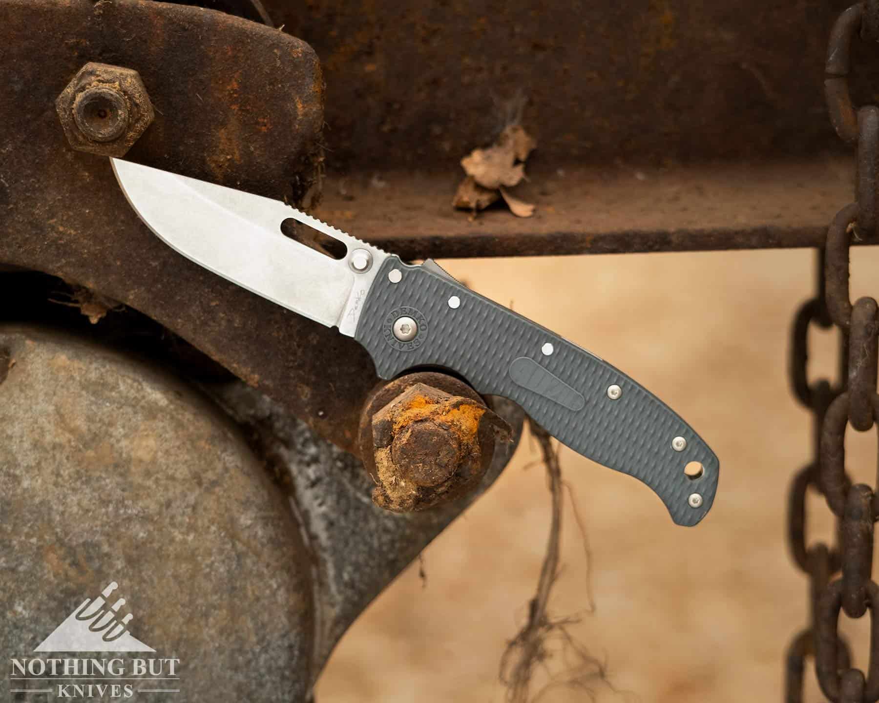 The Demko AD 20.5 with gray GFN handle scales and an AUS10 blade.