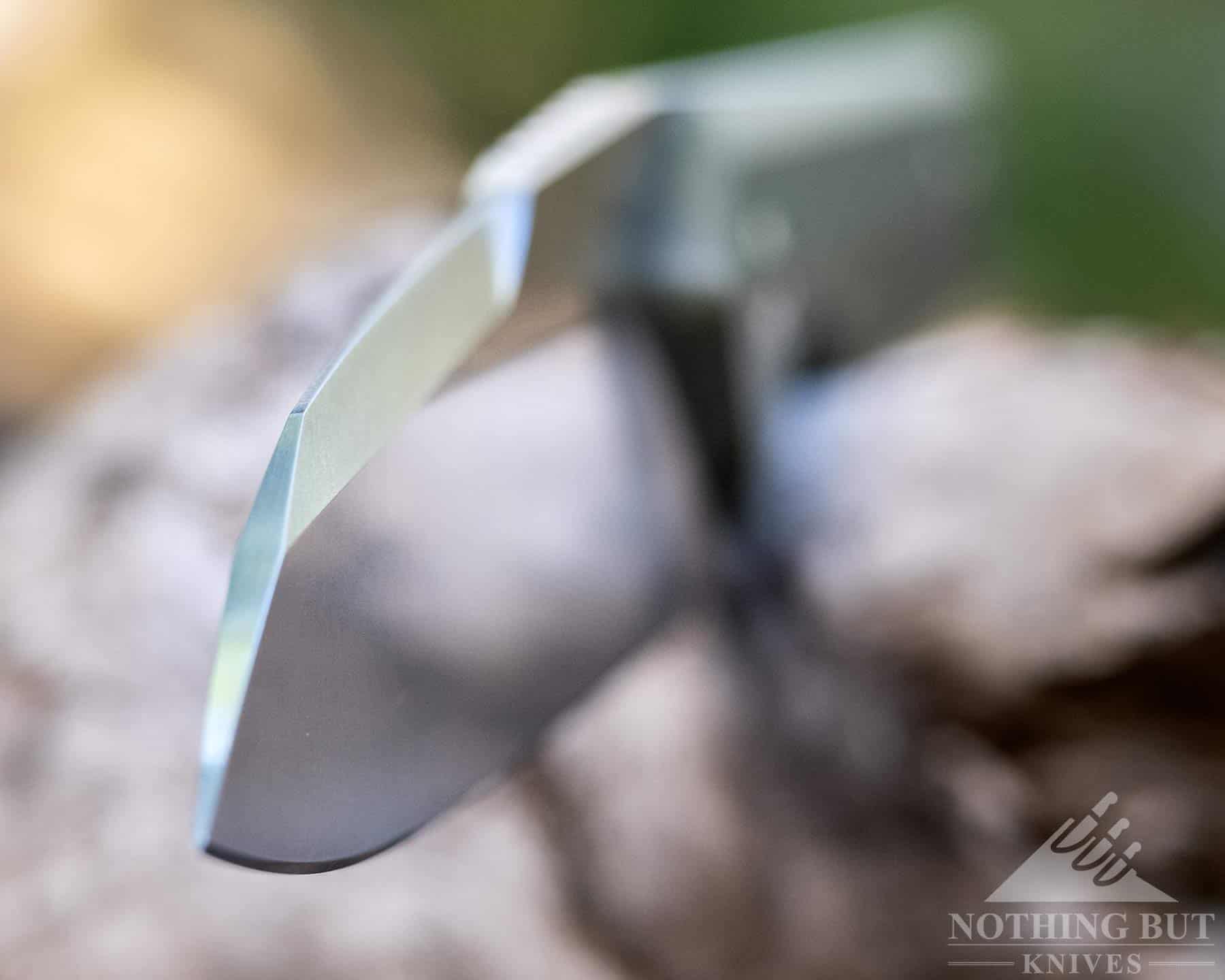 Civivi Kepler Review - Image 2 The Kepler has a tall, well angles blade. Shown here in a shallow depth of field close-up.