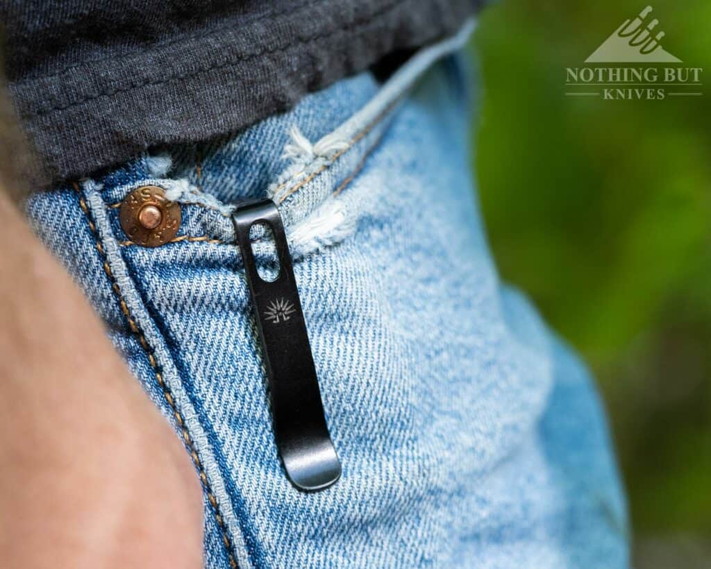 Off-Grid Knives Caiman Review - Image 8 The Off-Grid Caiman clipped into the pocket of a person's jeans.