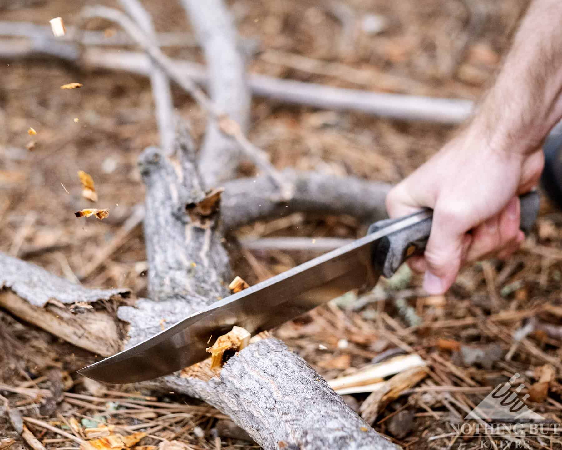 A close-up of the Plan A Bowie chopping. This image shows how well this knife bites into wood. 