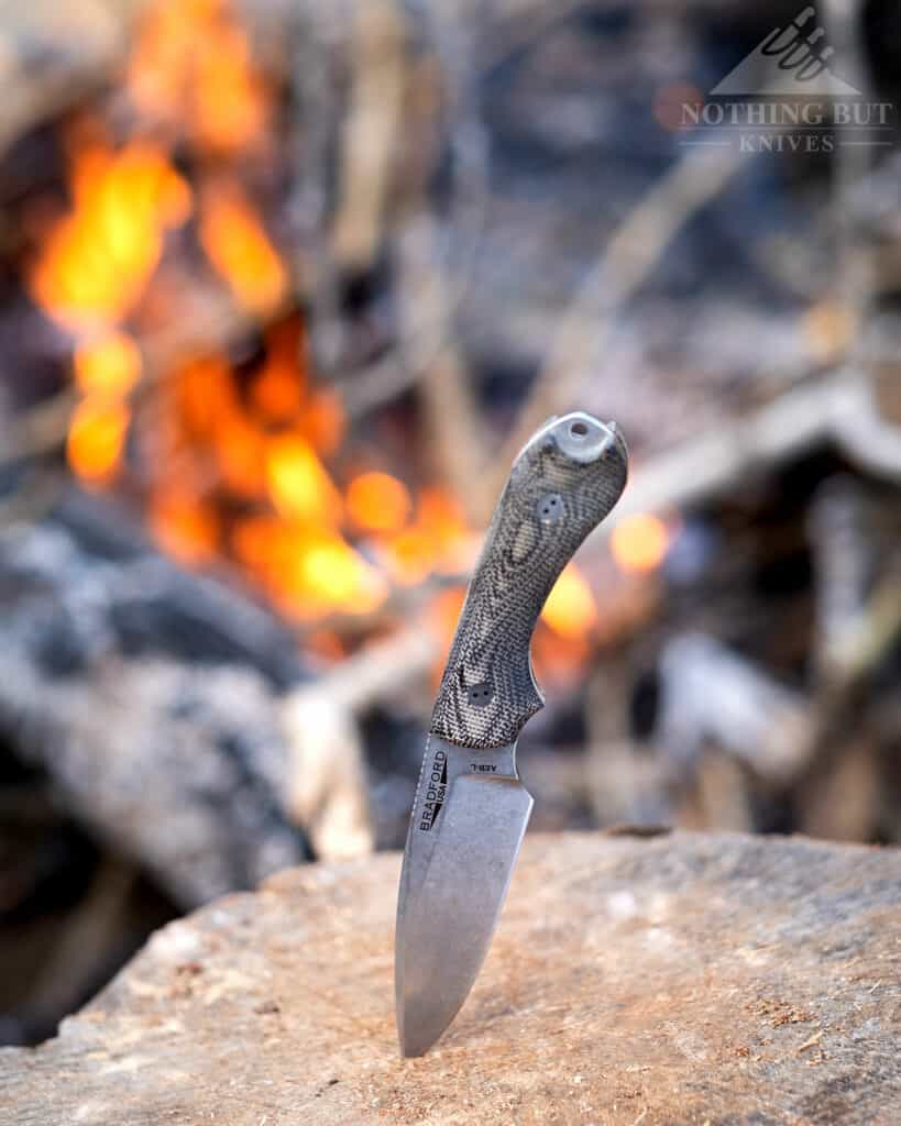 The Guardian 3 next to a campfire. It is a good camping knife even though it can't spark a ferro rod. 