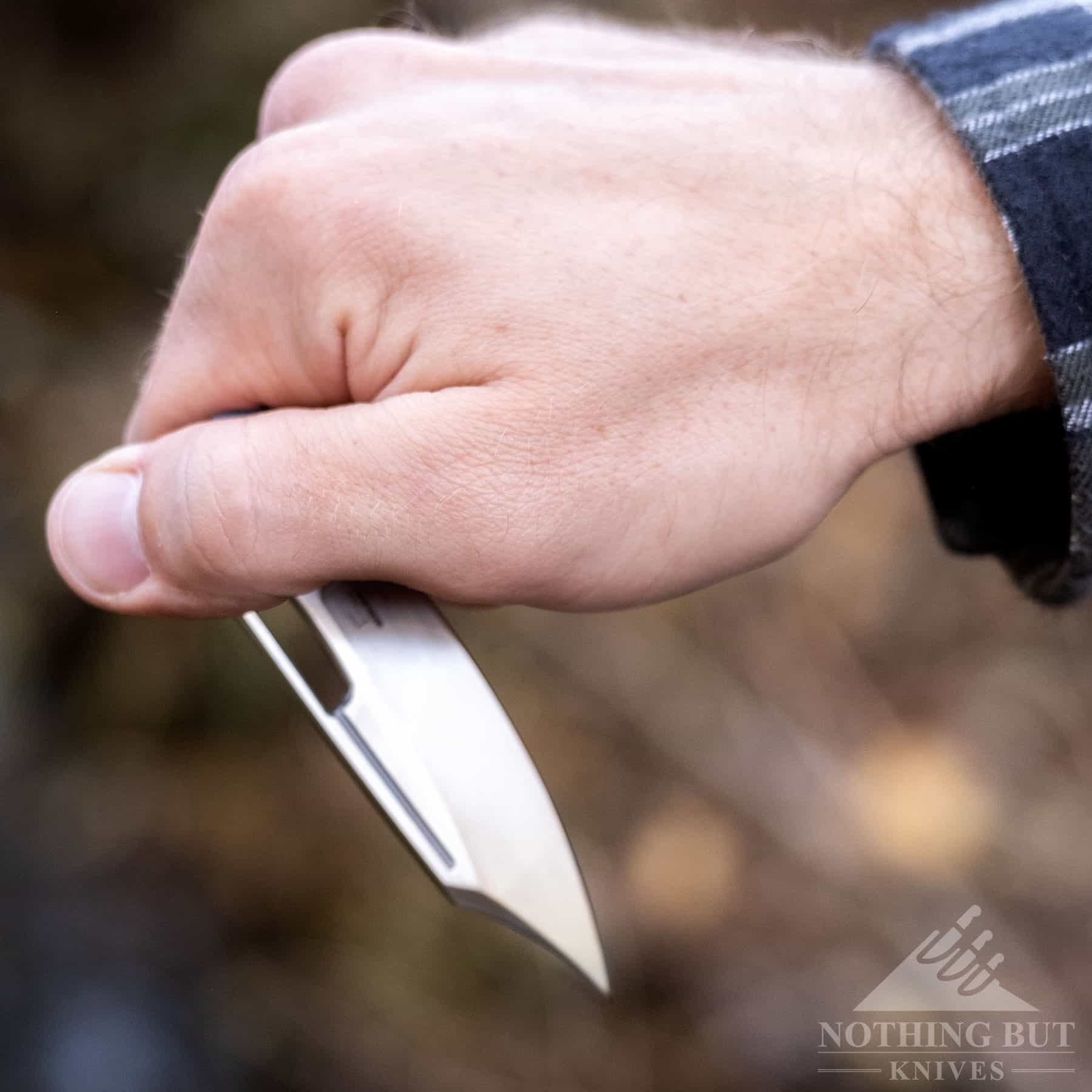 The Boker Plus HEA Hunter being opened with the thumb. 